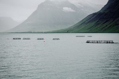 Scenic view of sea against mountain