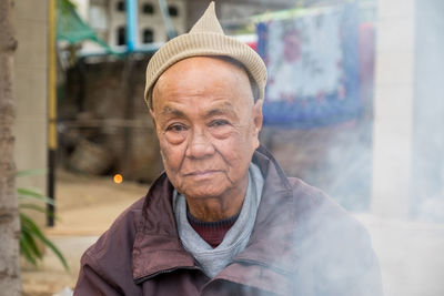 Portrait of man wearing hat