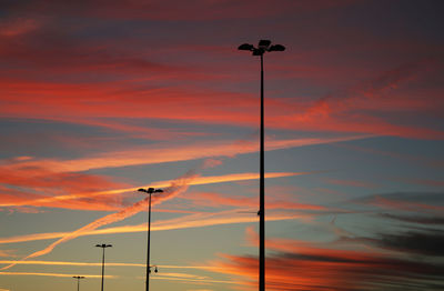 Low angle view of street light against sky