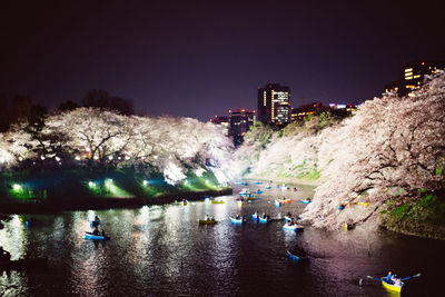 People in water at night