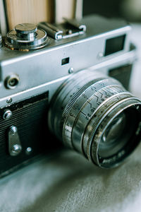 Close-up of camera on table