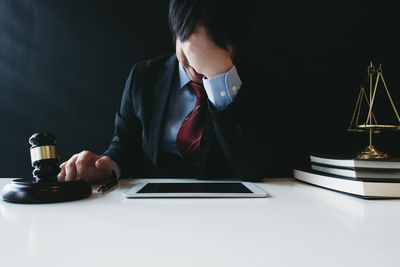 Man using laptop on table