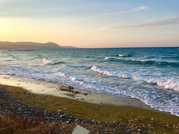 Scenic view of sea against sky during sunset