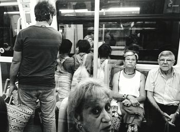 People standing on tiled floor