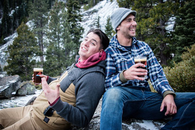 Friends sitting on mobile phone