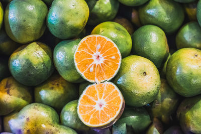 Full frame shot of oranges in market