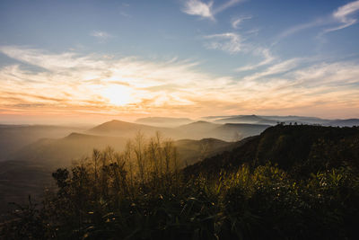 Scenic view of mountains against sky during sunset