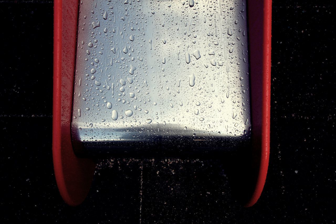 CLOSE-UP OF WATER DROPS ON WINDOW