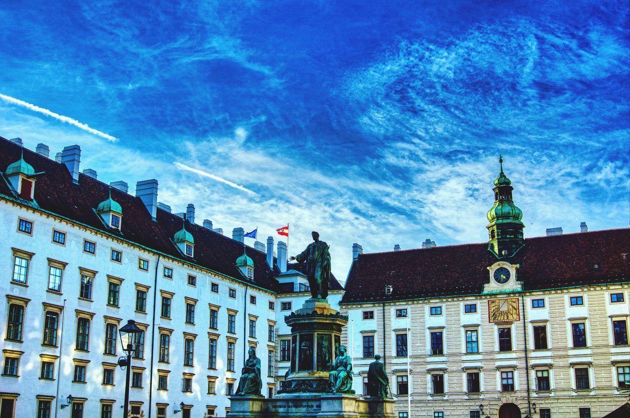 LOW ANGLE VIEW OF BUILDINGS AGAINST SKY