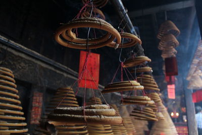 Low angle view of decorations hanging outside building