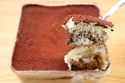 Close-up of cake in glass on table