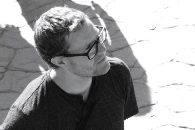 Portrait of man wearing sunglasses standing outdoors