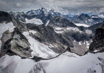 Scenic view of snow covered mountains