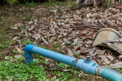 High angle view of pipe on field