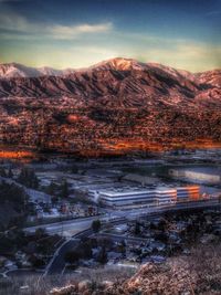 Scenic view of mountains against sky at sunset