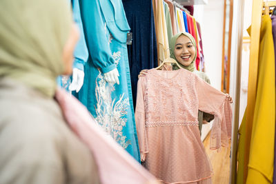 Smiling woman shopping in mall