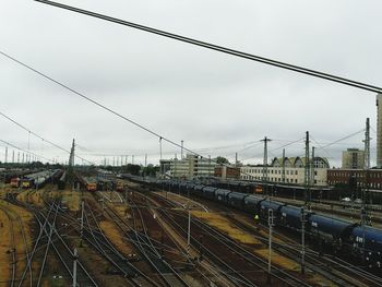 Train on railroad tracks against sky