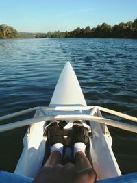 Cropped image of boat in lake