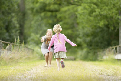 Girl running to her mother