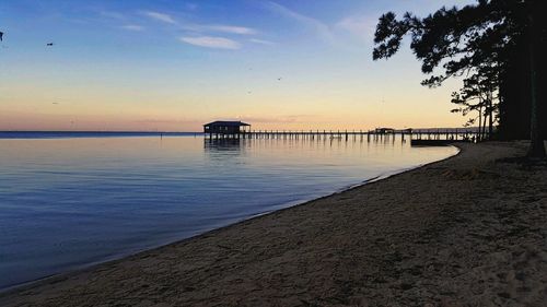 Scenic view of sea at sunset