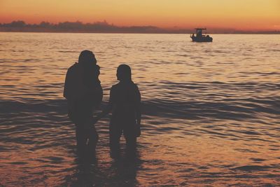 Scenic view of sea at sunset