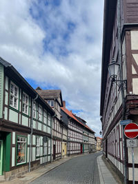 Buildings in city against sky