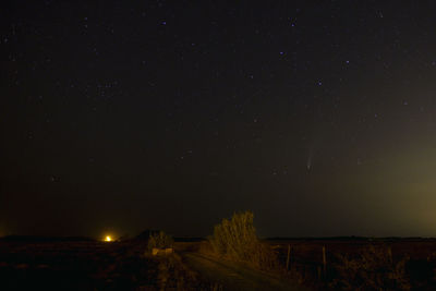 Scenic view of star field against sky at night