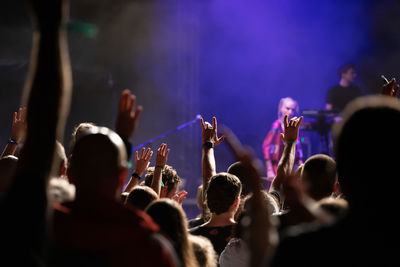 Group of people at music concert