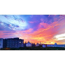 Scenic view of dramatic sky over city