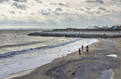 Scenic view of beach against sky
