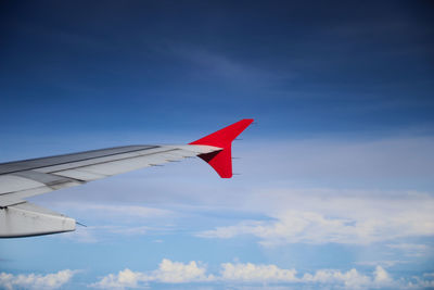 View of airplane wing through window