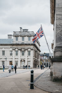 Union jack flag on university of greenwich building, london, uk.