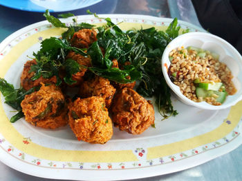 High angle view of food served on table