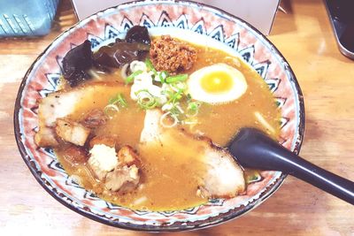 Close-up of soup served on table