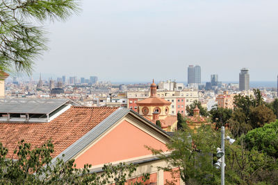 High angle view of buildings against clear sky