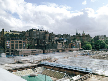 Glass roofs against old residential buildings