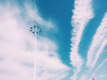 Low angle view of floodlight against sky