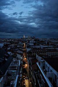 High angle view of city against cloudy sky