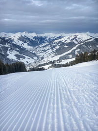 Scenic view of snowcapped mountains against sky