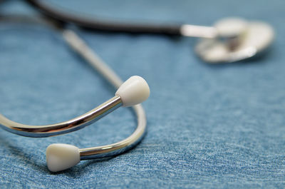 Close-up of metal on table