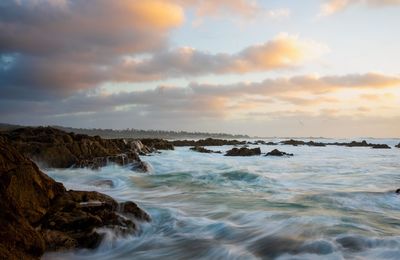 Scenic view of sea against sky during sunset