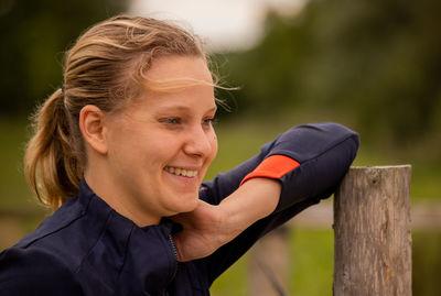 Portrait of smiling young woman outdoors