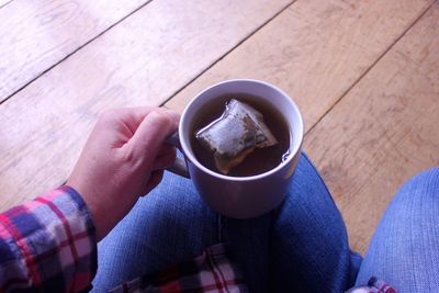 High angle view of coffee cup on table