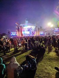 Crowd at music concert at night