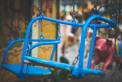 Close-up of wet slide in park