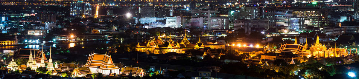 High angle view of illuminated buildings at night