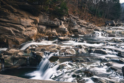 Scenic view of waterfall in forest