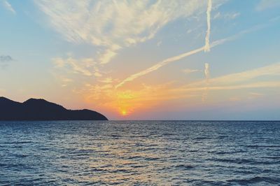 Scenic view of sea against sky at sunset