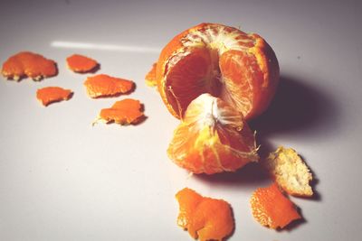 High angle view of orange fruits on table