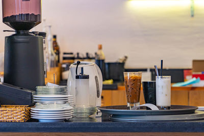 Close-up of containers on table